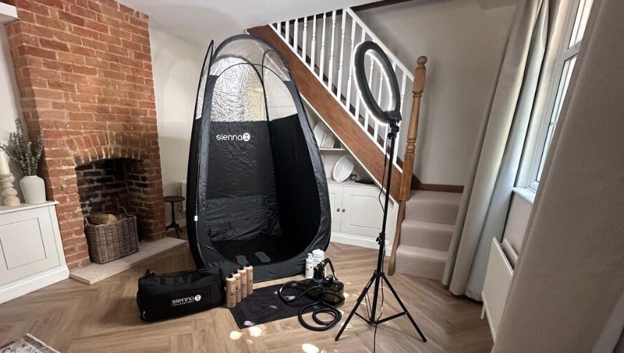 Glam + Tan's inviting tanning setup in Bishop's Stortford, England, GB with equipment and cozy ambiance.