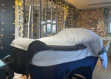 Tranquil massage room at Massage by Owen, Marden, England, GB, featuring soft lighting and cozy furnishings.