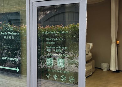 Entrance of Chanle Wellness Service in London, England, GB, showing opening hours and spa details.