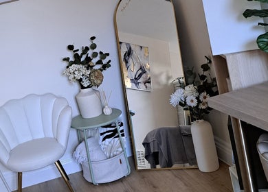 Elegant seating area with mirror at Regents Retreat, Nantwich, England, GB.