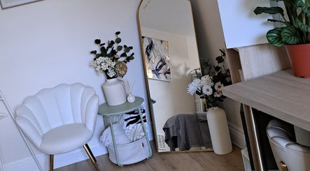 Elegant seating area with mirror at Regents Retreat, Nantwich, England, GB.