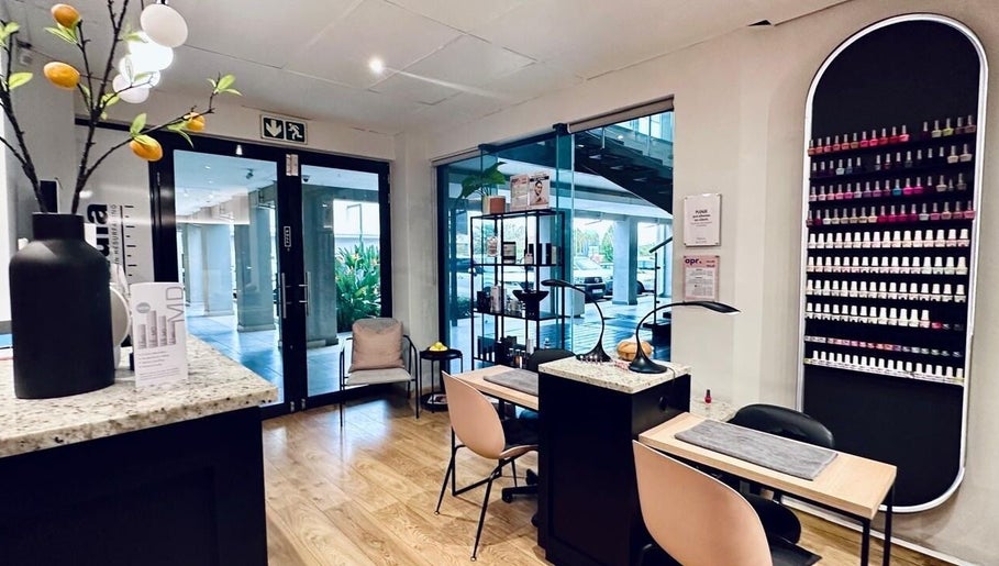 Elegant interior of Vivior Laser & Beauty Studio in Pretoria, Gauteng, ZA featuring nail polish display.