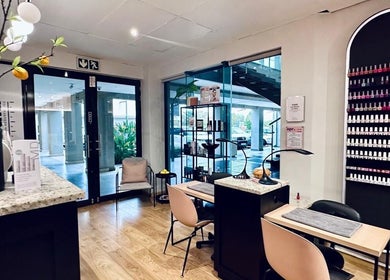 Elegant interior of Vivior Laser & Beauty Studio in Pretoria, Gauteng, ZA featuring nail polish display.