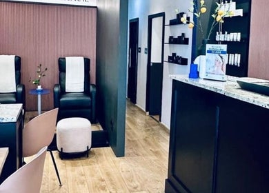 Vivior Laser & Beauty Studio reception area in Pretoria, Gauteng, ZA with modern chairs and decor.