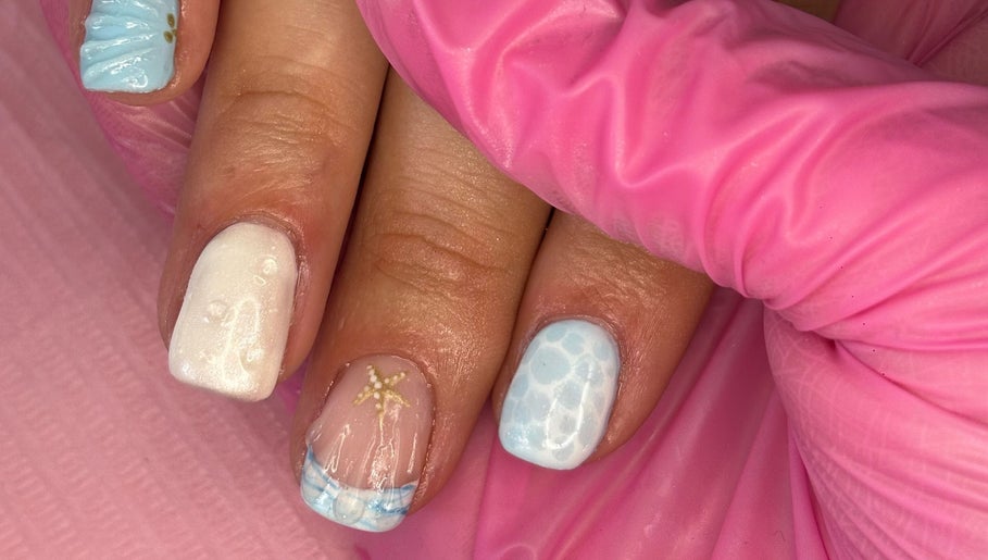 Close-up of ocean-themed nail art at Steel and Polish Nails, Loxley, England, GB.