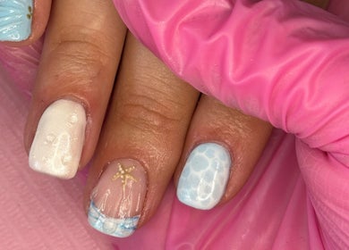 Close-up of ocean-themed nail art at Steel and Polish Nails, Loxley, England, GB.
