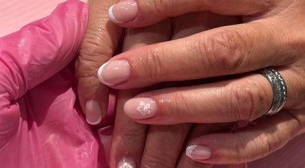 French manicure with floral design at Steel and Polish Nails, Loxley, England, GB.