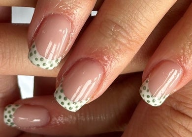 Polka dot nail art at Steel and Polish Nails in Sheffield, England, GB, showcasing chic manicure design.