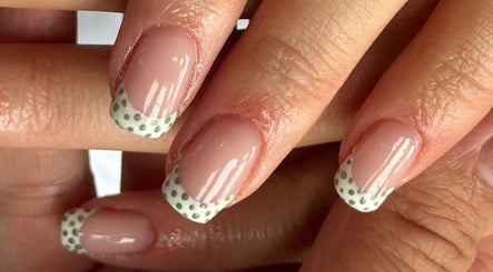 Polka dot nail art at Steel and Polish Nails in Sheffield, England, GB, showcasing chic manicure design.