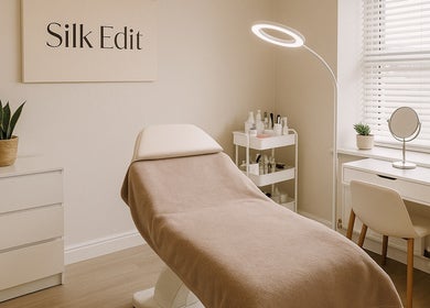 Stylish treatment room at The Silk Edit, Glasgow, Scotland, GB, featuring a sleek modern design.