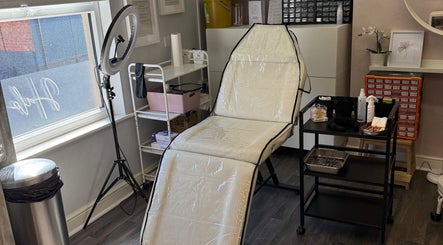 Modern treatment room at Obsession Medical Aesthetics, Bedale, England, GB, with professional equipment.
