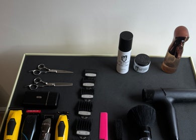 Hair tools and products at Reset Barbers, Beccles, England, GB showcasing scissors, clippers, and grooming items.