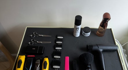 Hair tools and products at Reset Barbers, Beccles, England, GB showcasing scissors, clippers, and grooming items.