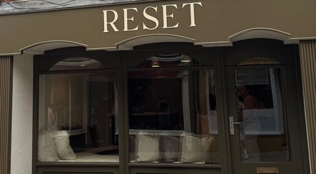 Front view of Reset Barbers located in Beccles, England, GB with stylish exterior design.