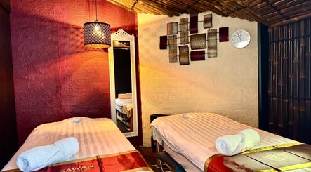 Cozy massage room at Sawan Thai Massage & Wellness, Mornington, Victoria, AU with warm lighting and decor.