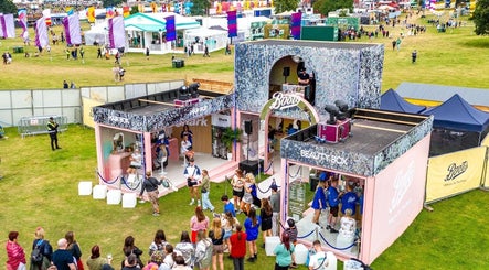 Crowds gather at Boots @ Main Arena in Portlaoise, County Laois, IE, showcasing a lively beauty and wellness event.