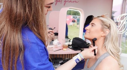 Makeup artist at Boots @ Main Arena in Portlaoise, County Laois, IE applying makeup outdoors.