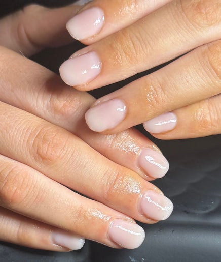 Manicured hands with glossy nails at Claws by Jaimee, Hope Island, Queensland, AU.