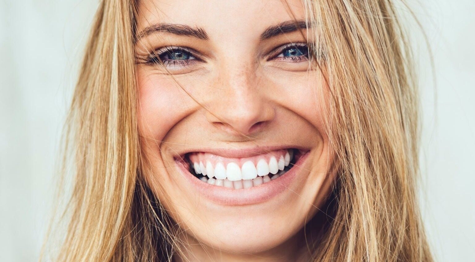 Close-up of a woman's radiant smile at Gunther Oliver - Skin Medic / Cape Town, Western Cape, ZA.