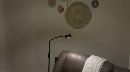 Cozy seating area with wall decor at Dakkat Athiyah, Riyadh, Riyadh Province, SA.