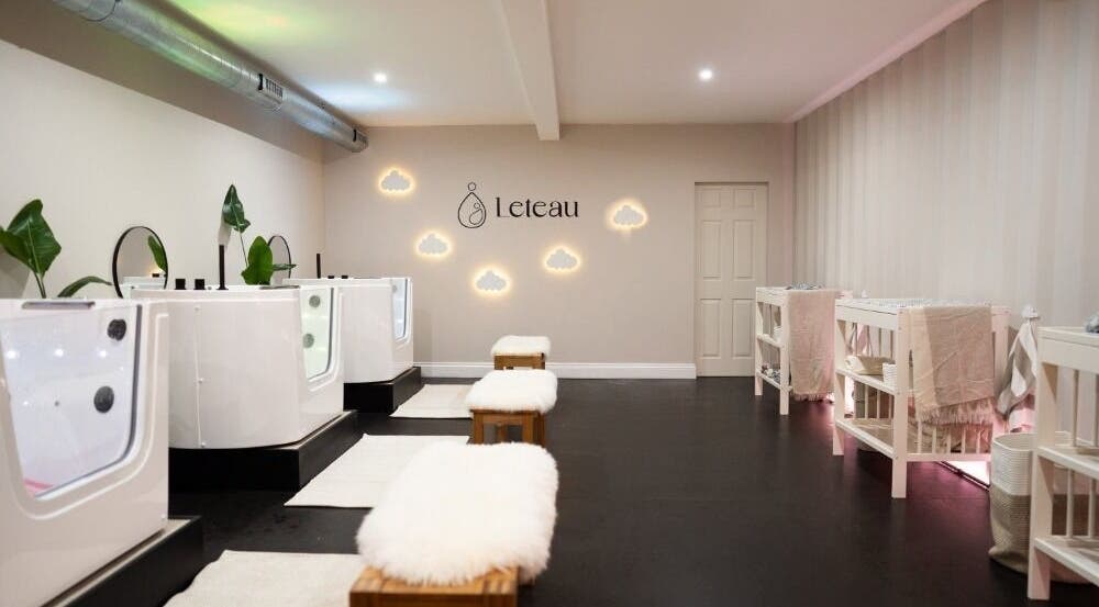 Modern wellness space at Leteau, Bristol, England, GB with plush seating and ambient lighting.