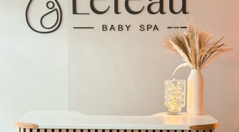 Reception area at Leteau in Bristol, England, GB, with elegant decor and ambient lighting.