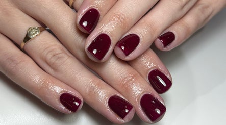 Elegant crimson nails at Nails By Kay in Bromsgrove, England, GB, showcasing expert manicure service.