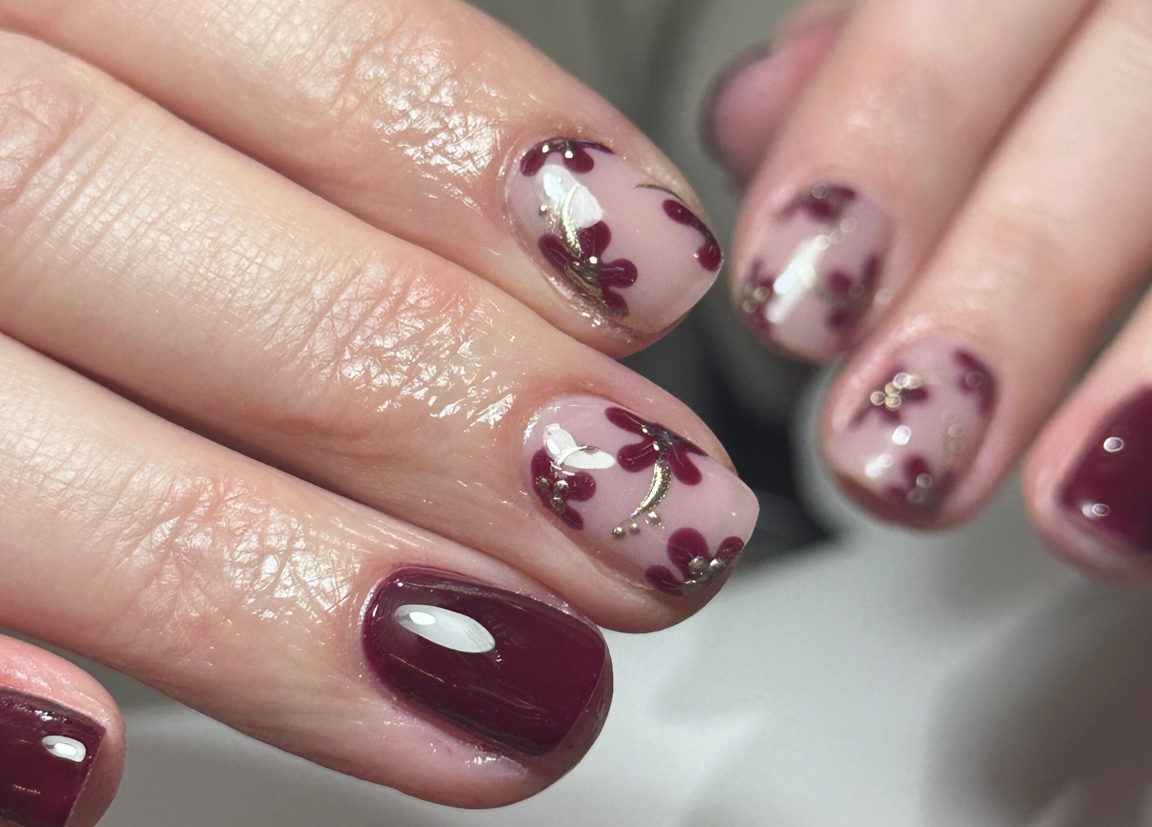 Elegant nail art with floral designs at Nails By Kay, Bromsgrove, England, GB.