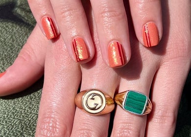 Stylish glittery orange nails from Jada Ellize Nails, London, England, GB, showcasing stunning nail art.