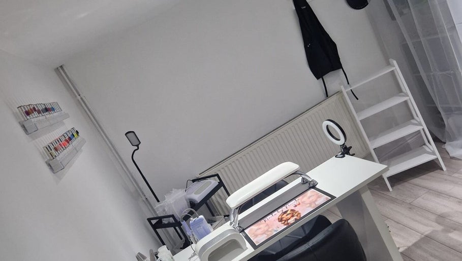 Sleek nail salon setup at Polished by Isobel in Oughtibridge, England, GB with manicure tools and nail polish display.
