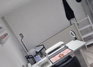 Sleek nail salon setup at Polished by Isobel in Oughtibridge, England, GB with manicure tools and nail polish display.