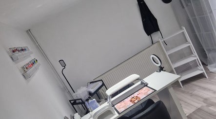 Sleek nail salon setup at Polished by Isobel in Oughtibridge, England, GB with manicure tools and nail polish display.
