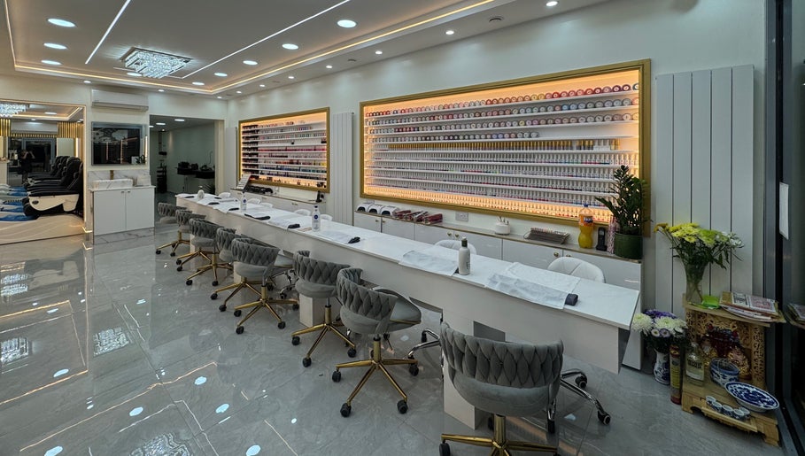 Spacious, modern nail salon interior at Nailounge Hounslow, Hounslow, England, GB with sleek decor and ample seating.