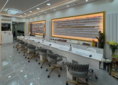 Spacious, modern nail salon interior at Nailounge Hounslow, Hounslow, England, GB with sleek decor and ample seating.