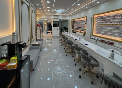 Chic interior of Nailounge Hounslow in Hounslow, England with stylish nail bar and comfy seating.