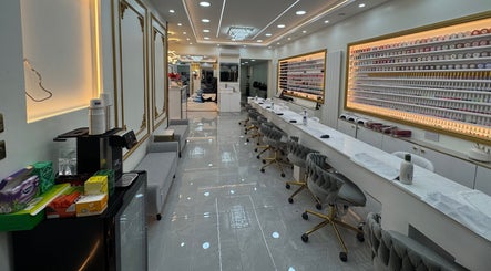 Chic interior of Nailounge Hounslow in Hounslow, England with stylish nail bar and comfy seating.
