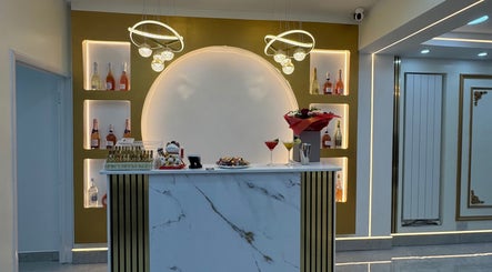 Stylish reception at Nailounge Hounslow, featuring elegant decor and warm lighting in Hounslow, England, GB.