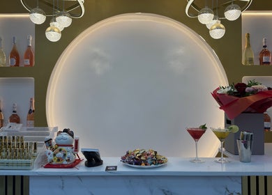 Elegant reception at Nailounge Hounslow, Hounslow, England, GB with drinks, decor, and ambient lighting.