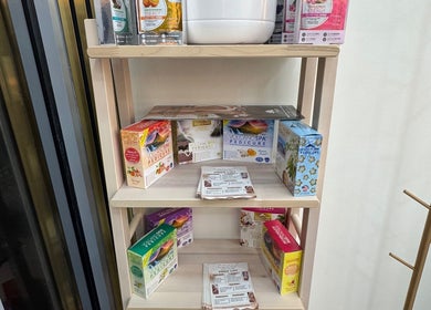 Pamper products on shelves at Nailounge Hounslow, Hounslow, England, GB showcasing pedicure options.