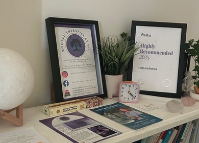 Awards and decor at Rooted Therapies by Vic in Whiston, England, GB, showcasing a serene wellness ambiance.