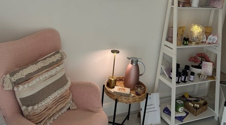 Relaxing corner at Rooted Therapies by Vic at Bohemian Stars, featuring plush chair and display in Liverpool, England, GB.