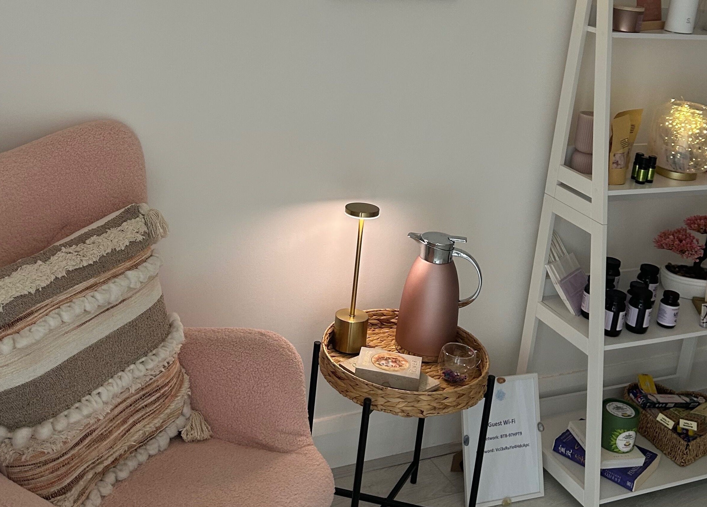 Cozy corner with soft chair and shelf at Rooted Therapies by Vic at Bohemian Stars, Liverpool, England, GB.