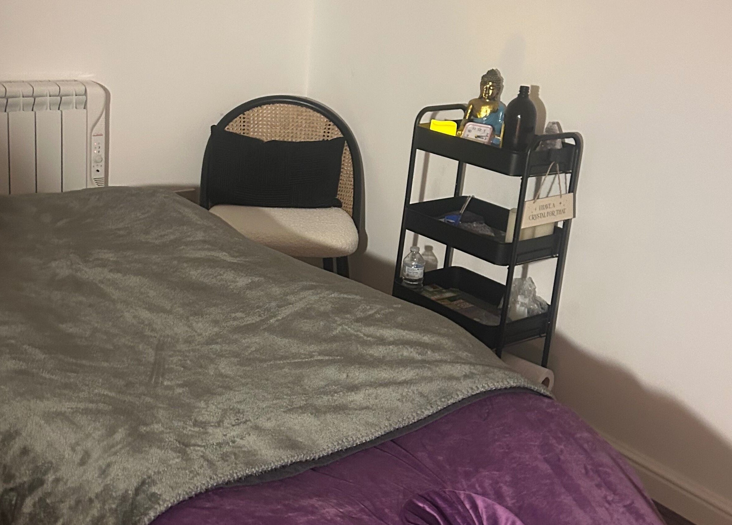 Cozy therapy room at Rooted Therapies by Vic at Bohemian Stars, Liverpool, England, GB, featuring massage bed.