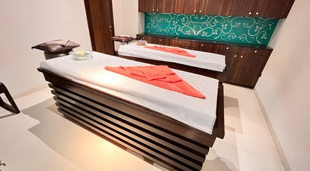 Inviting massage tables at Ojas wellness Spa in Bengaluru, Karnataka, IN offer a peaceful relaxation experience.