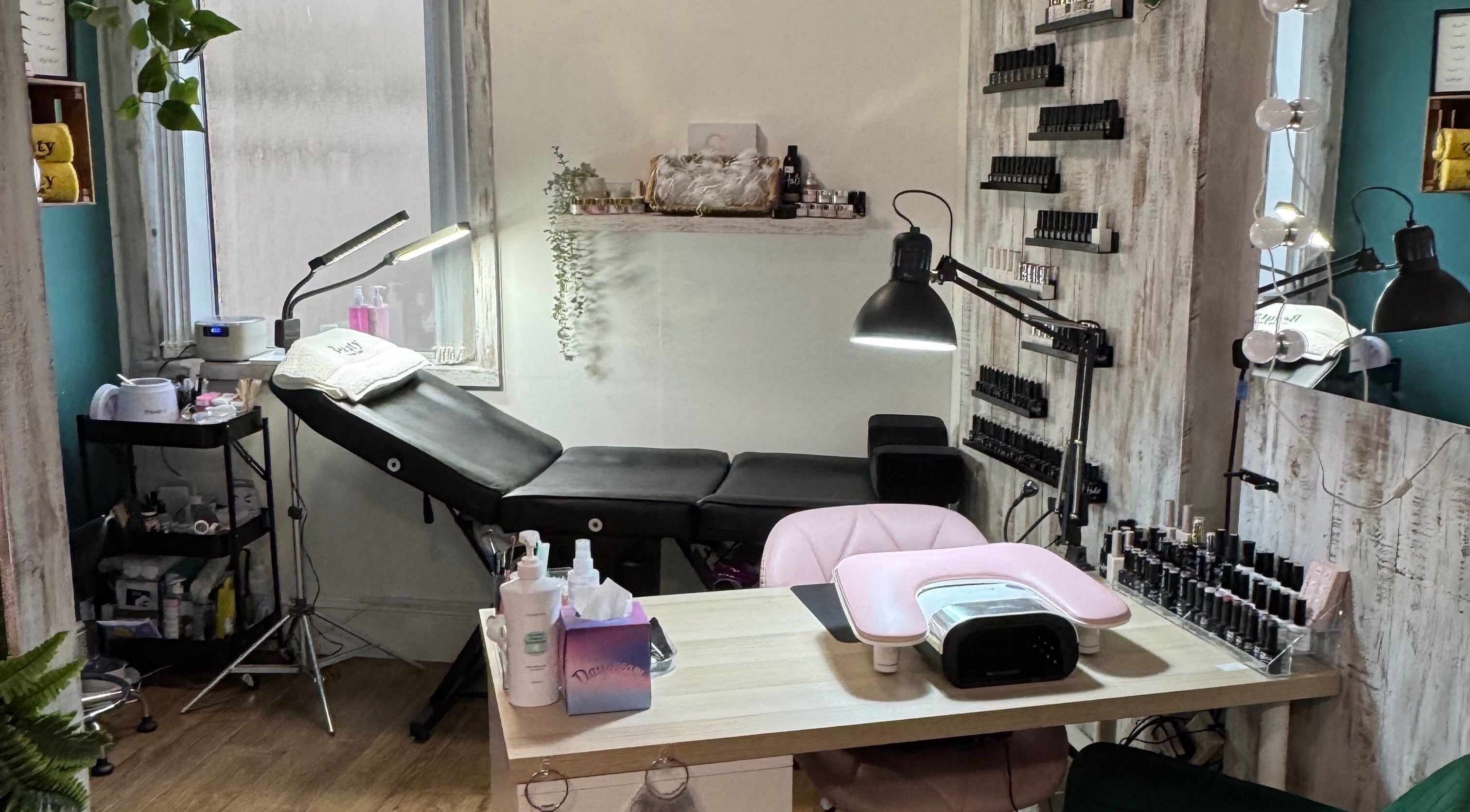 Relaxing treatment area at Beauty by Zoe, Griffithstown, Wales, GB with cozy decor and ample lighting.