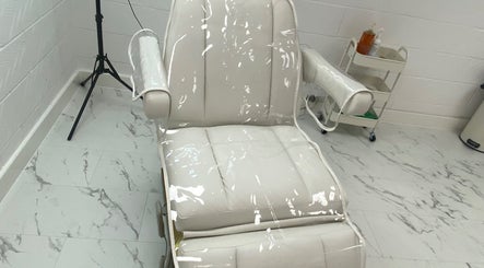 Luxurious treatment chair at Freyaroseaesthetics, Lowestoft, England, GB, offering a serene and relaxing space.