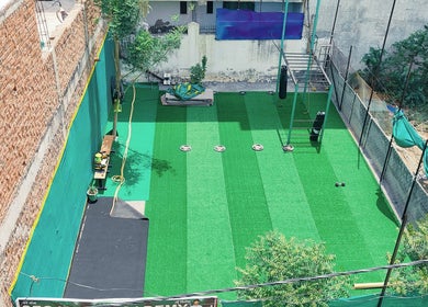 Outdoor fitness space at SFG Yoga Academy, Orai, Uttar Pradesh, IN, perfect for yoga and wellness activities.