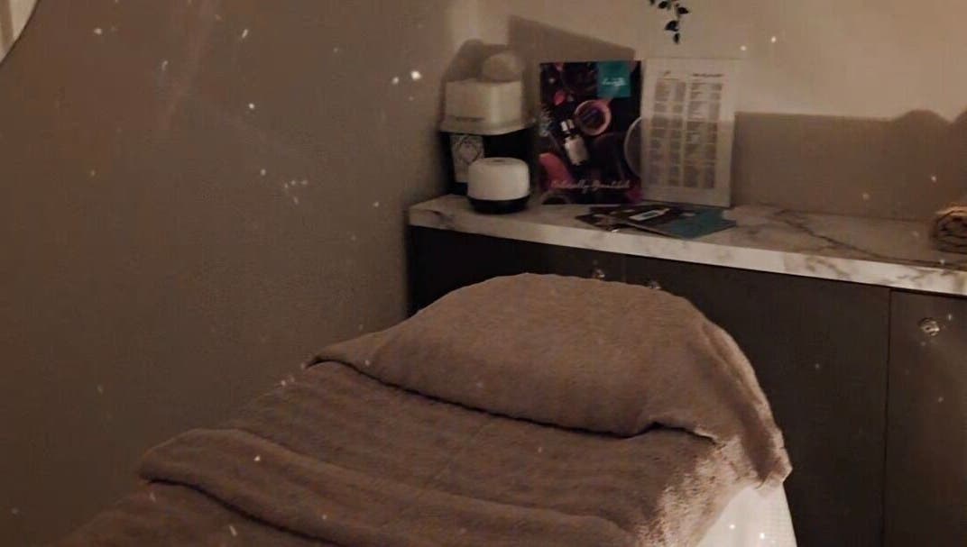 Serene massage room at Jayora Beauty in Colwyn Bay, Wales, GB, featuring a cozy massage bed.