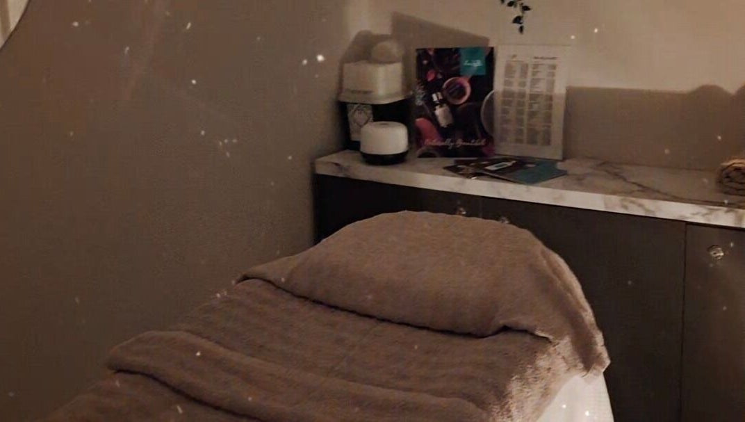 Serene massage room at Jayora Beauty in Colwyn Bay, Wales, GB, featuring a cozy massage bed.