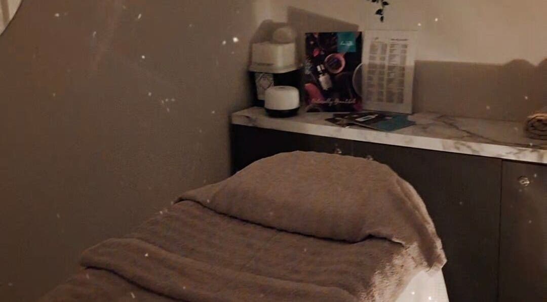 Serene massage room at Jayora Beauty in Colwyn Bay, Wales, GB, featuring a cozy massage bed.